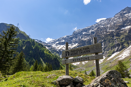 Tour du Montblanc beautiful mountain peaks and green valley. TMB trekking route scenic landscape in italian, swiss and french Alps in Chamonix valley alpine scene