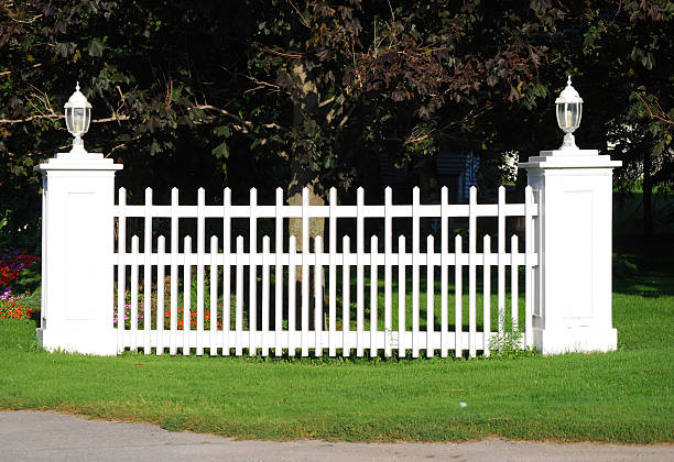 istock Section of a white picket fence 155325754