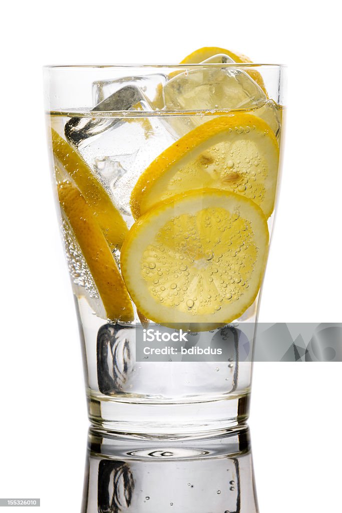 Water with lemons. Water with lemon Alcohol - Drink Stock Photo