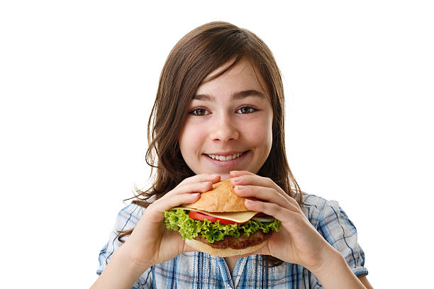 Girl eating sandwich