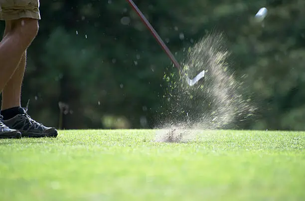 Photo of Golf turf explosion with ball in air