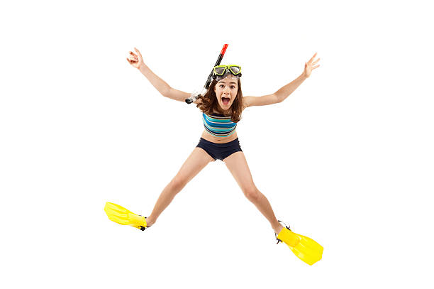 Girl with diving equipment isolated on white background