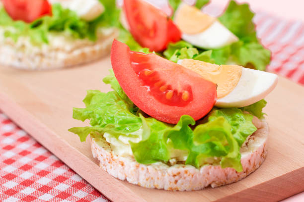 istock Rice Cake Sandwiches with Tomato, Lettuce and Egg 1553281534