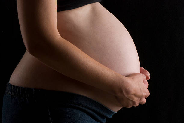 istock Pregnant belly, side 155328157