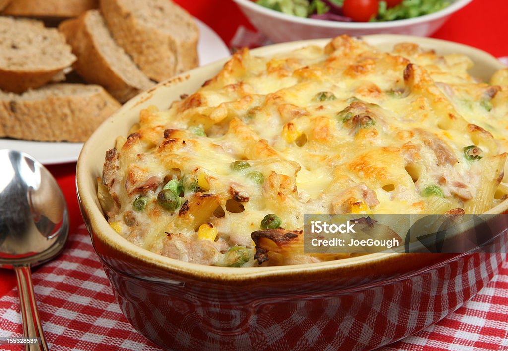 Tuna Pasta Bake Rigatoni pasta bake with tuna and topped with cheese. Noodle Casserole Stock Photo