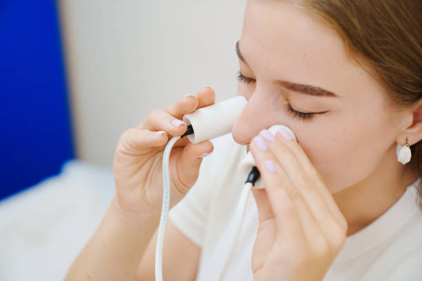 istock A patient on a magnetotherapy procedure on the nose 1553285863