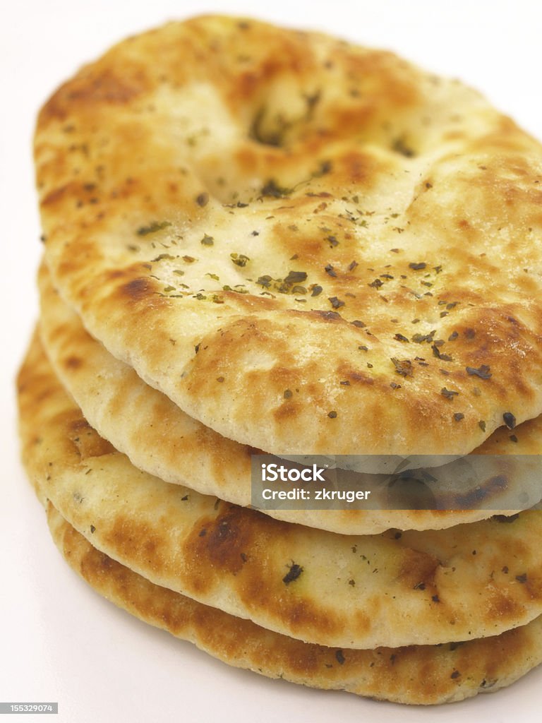 stack of naans stack of indian naan bread Baked Stock Photo