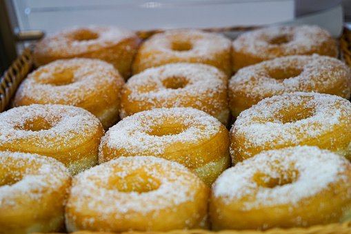 Glazed donuts on tray.  Selective focus.