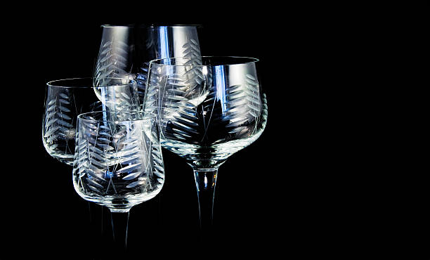 Four crystal glasses stock photo