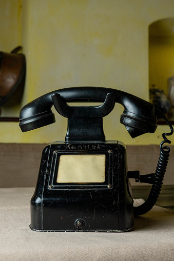 Antique telephone on the table