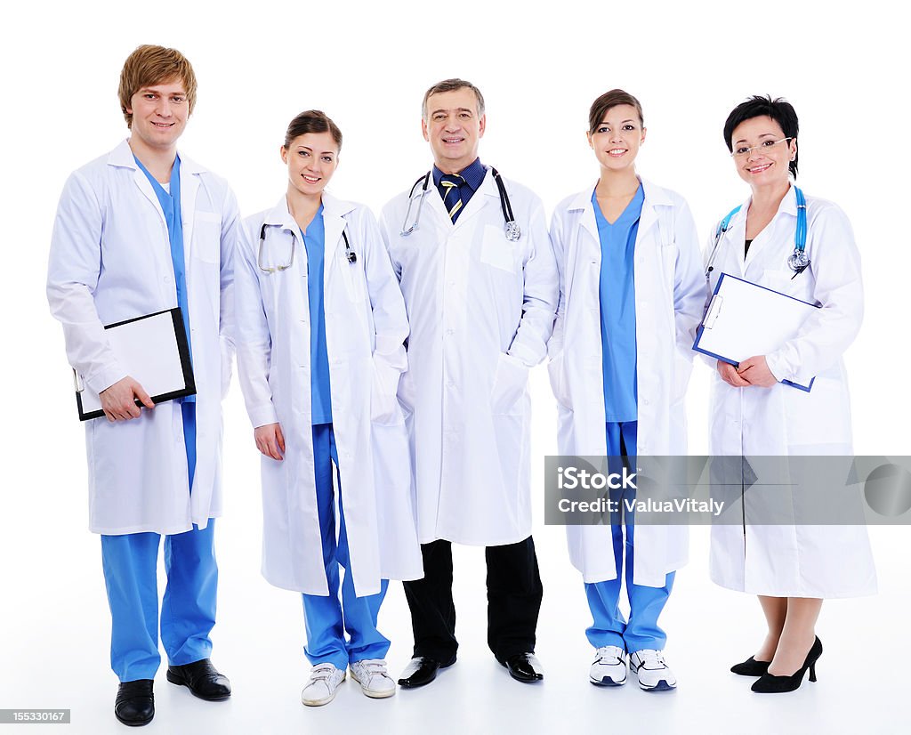 Cinco feliz rir médicos em Roupa de hospital - Royalty-free Adulto Foto de stock