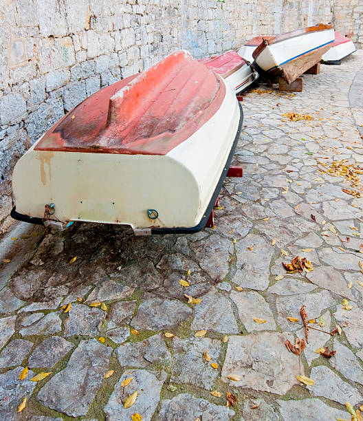 Boats by the wall stock photo