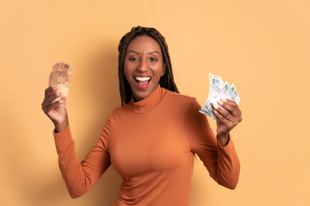 istock fun woman celebrating successful business 1553327115