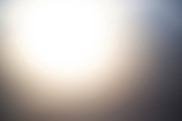 istock Blurred bright abstract background with a spot of light. 1553328210
