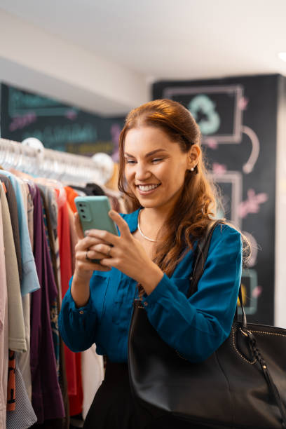 istock Customer Shopping in thrift clothing Store 1553336070