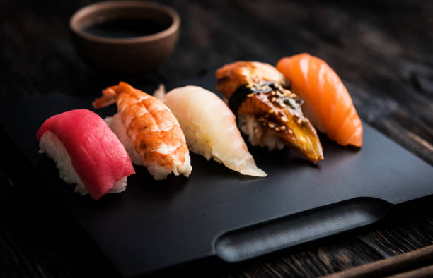 istock sashimi sushi set with chopsticks and soy 1553365774