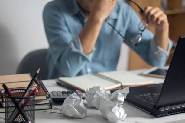 istock The crumpled paper left on the desk due to stress. 1553386801