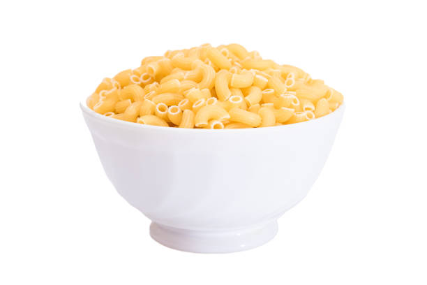 istock Uncooked Chifferi Rigati Pasta in White Cup Isolated on White Background 1553388326