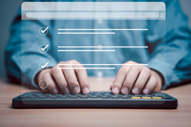 istock Businessman using computer keyboard to tick correct sign mark in checkbox for quality document control checklist and business approve project concept. 1553416699
