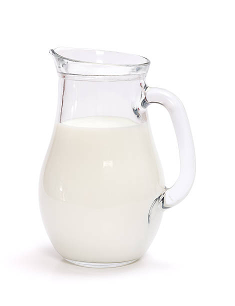 istock Milk in glass jug 155341722