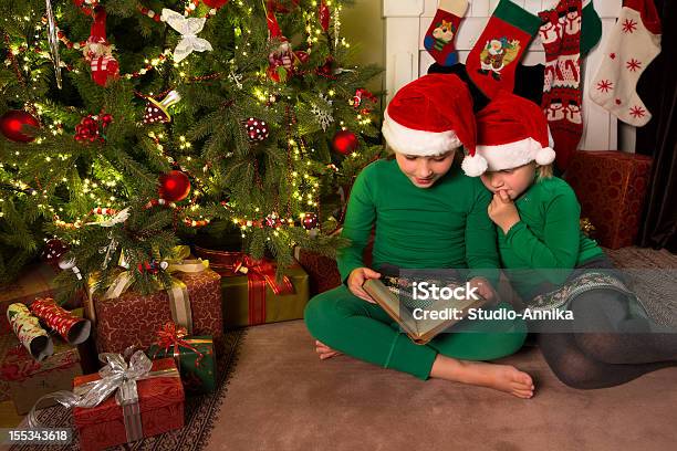 Reading Christmas Stories Stock Photo - Download Image Now - Book, Box - Container, Celebration