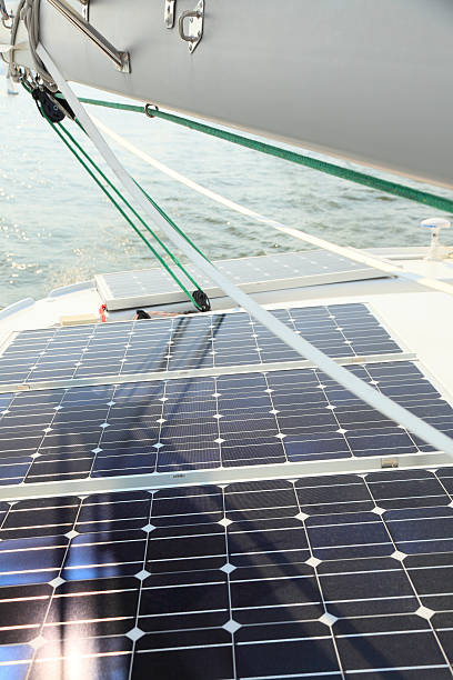istock Solar Panels charging batteries aboard sail boat 155344019