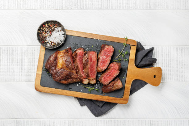 istock Sliced beef ribeye steak 1553453504