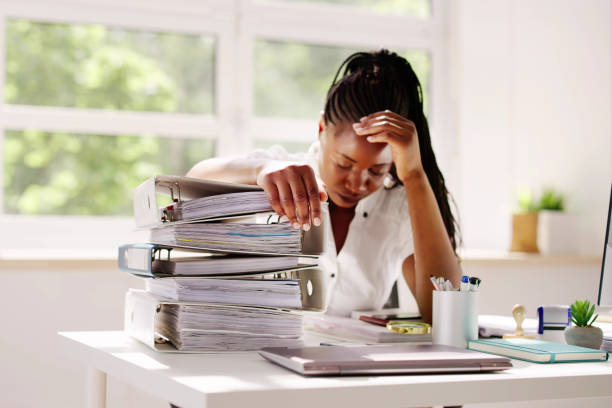 istock Workaholic Accountant Businesswoman With Headache 1553459410