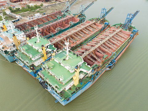 Transport ships anchored in river channels