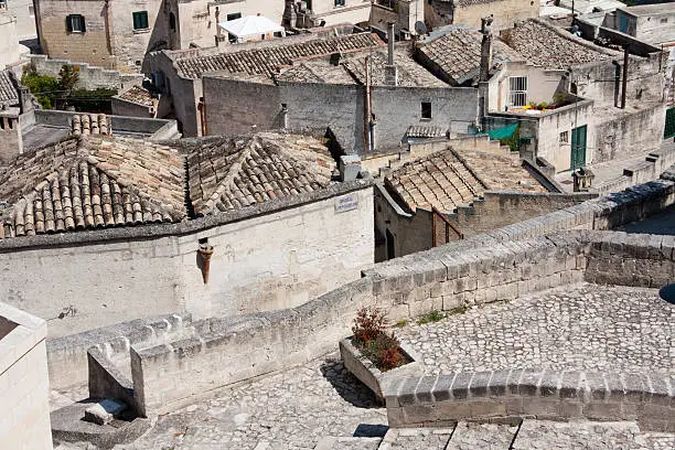 Cityscape detail of Sassi di Matera, toward sasso Barisano, during a summer sunny day.