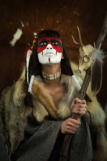 istock Shaman woman with war mask 155347218