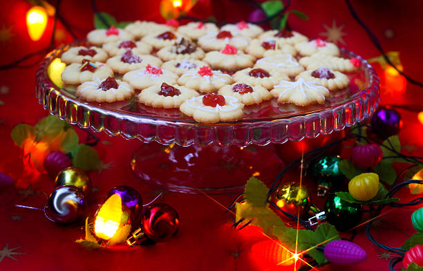 Spritz cookies filled with jam and decoration for  Christmas
