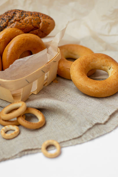 istock Small dry bagels, small buns on a light background. Bakery. 1553477737