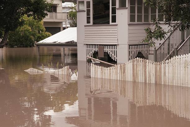 Landscape view of house flooded several feet deep Flood  Brisbane  area Queensland declared natural disaster  queensland photos stock pictures, royalty-free photos & images