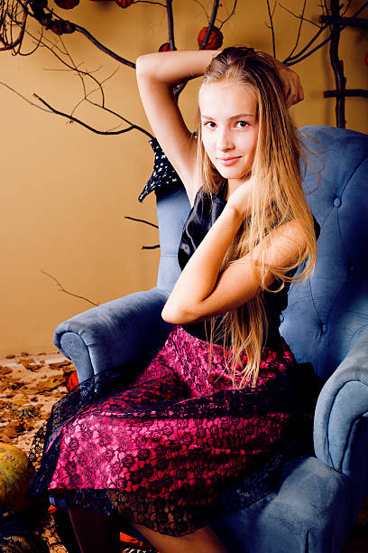istock pretty blonde girl at halloween 155347848