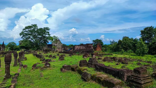 Photo of The good view of old sanctuary and the big tree of Wat Phou/vat Phou Hindu /vat Phou Temple complex is the UNESCO world heritage site in Champasak, Southern Laos.