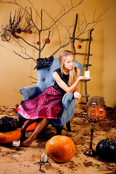 istock pretty blonde girl at halloween 155349877