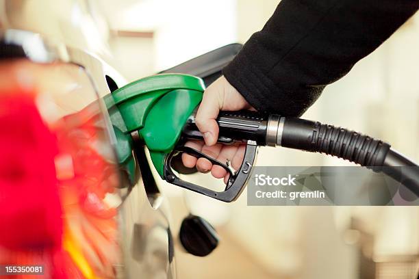 At The Gas Station Stock Photo - Download Image Now - Fuel Pump, Gasoline, Gas Station