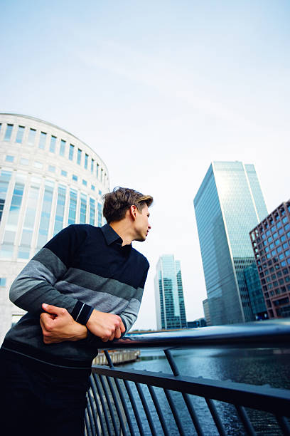 istock Young Man standing on bridge, London 155350680