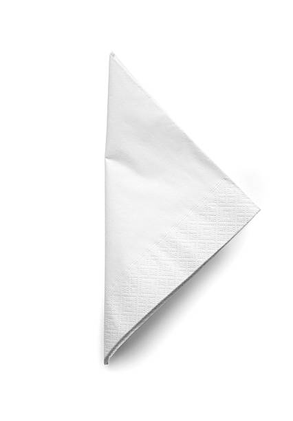 Folded White Cocktail Napkin - isolated Folded Cocktail Napkin isolated on white Background,  napkin photos stock pictures, royalty-free photos & images