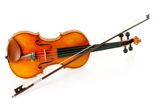 Isolated violin and bow.
