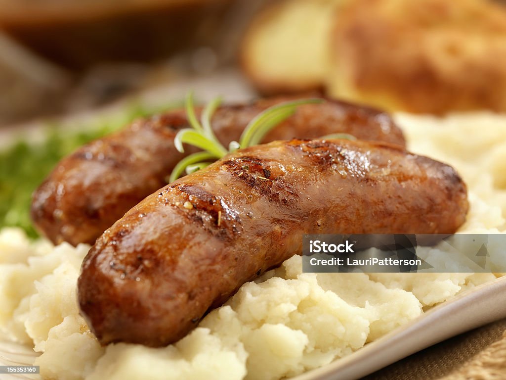 Mit Kartoffelpüree (Bangers and Mash - Lizenzfrei Wurst Stock-Foto