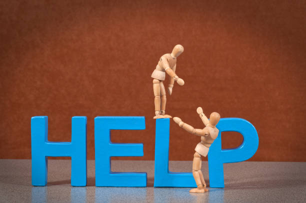 istock Help - Wooden Mannequin demonstrating this word 155353179