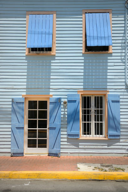istock wooden townhouse with shutters on Key West Florida 155353425