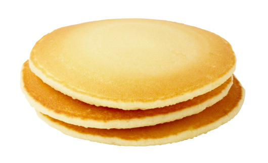 Pancakes isolated on white background.  Larger files include clipping path.  Professionally shot, color corrected, exported 16 bit and retouched for maximum image quality.