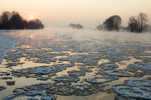Winter frost landscape outgoing into the horizon. Beautiful nature in january. Forest and frozen Seversky donets river.