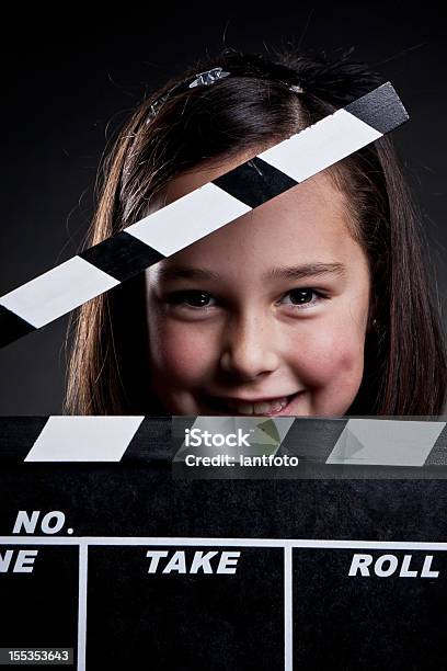 Criança Feliz Com Filme Mesa De Pedra - Fotografias de stock e mais imagens de Criança - Criança, Fotografia de Estúdio, Indústria Televisiva