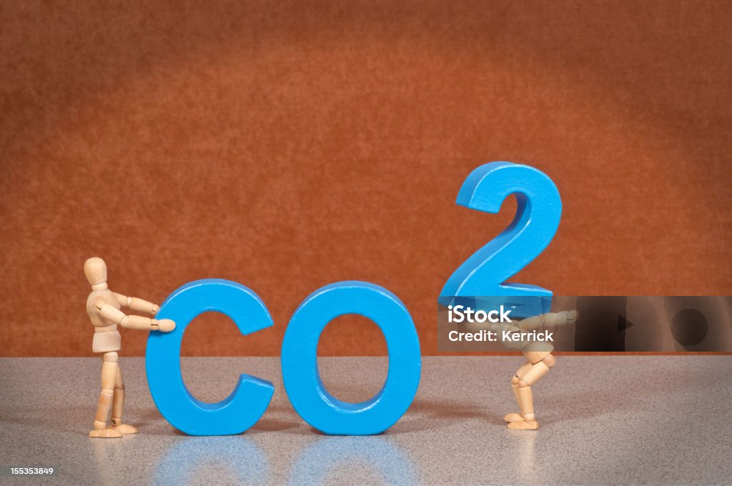 CO2- hölzerne Kleiderpuppe was das Wort - Lizenzfrei Abgas Stock-Foto