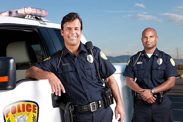 istock Friendly Police Officers 155354030