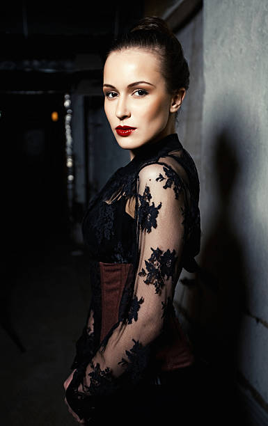 istock Beautiful Young Woman wearing corset posing 155354268